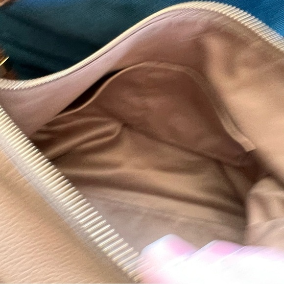 MICHAEL KORS COLLECTION
Skorpios Desert Tan Pebbled Leather Hobo
Bag $79… - Picture 13 of 16